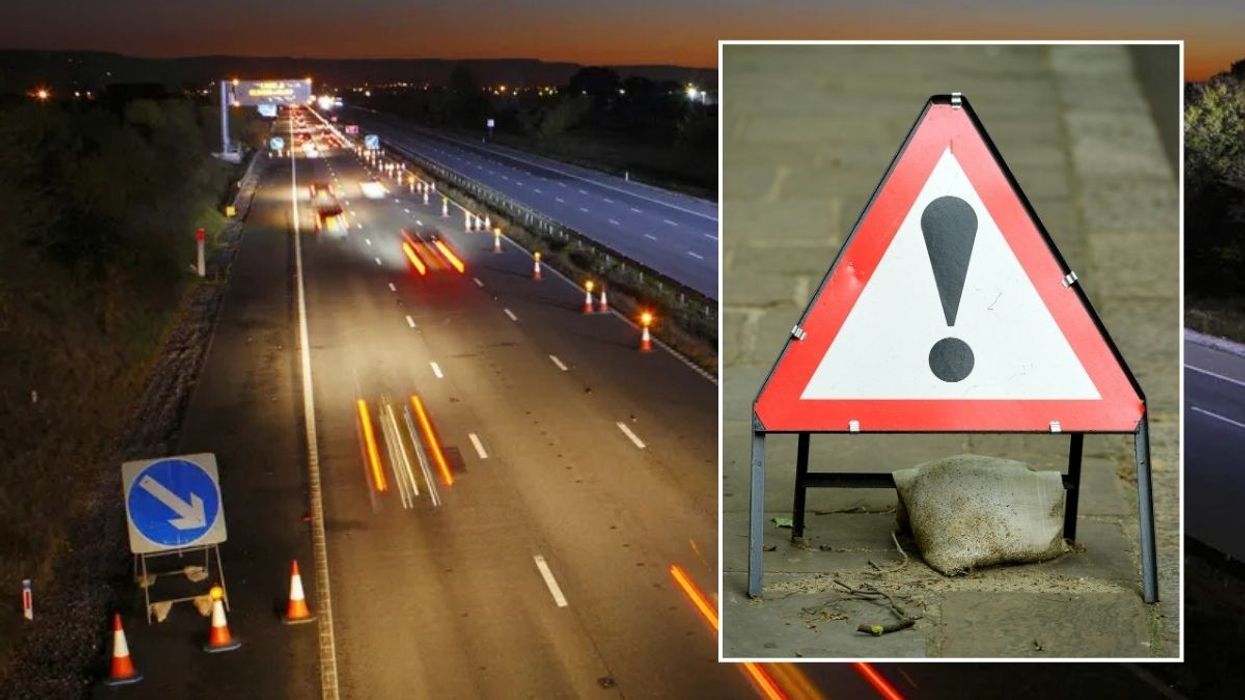 Driving on a road at night and a warning sign