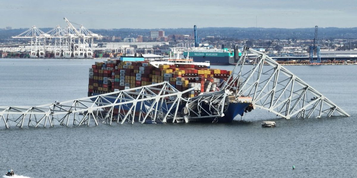 NextImg:Baltimore bridge collapse: Body pulled from water amid intense search for those who fell into freezing waters