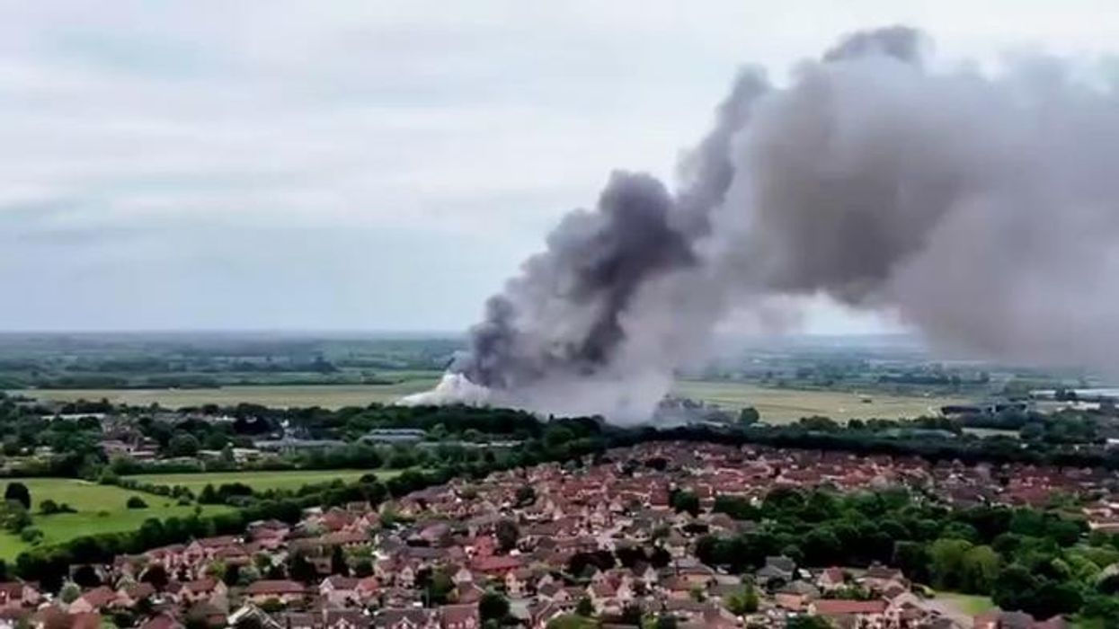Bicester fire: Two firefighters among three dead after huge blaze rips through ex-RAF base