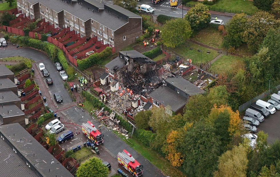 Drone pictures show at least one house completely destroyed