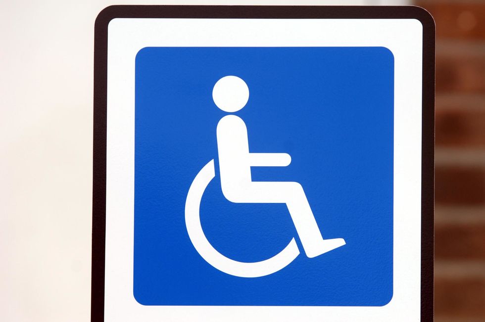 Dropping off space for disabled person/