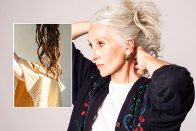 Drying hair / woman with long grey hair