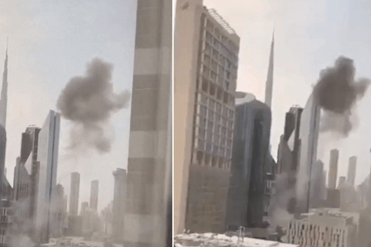 Dubai financial district rocked by explosion with black smoke seen billowing above skyline