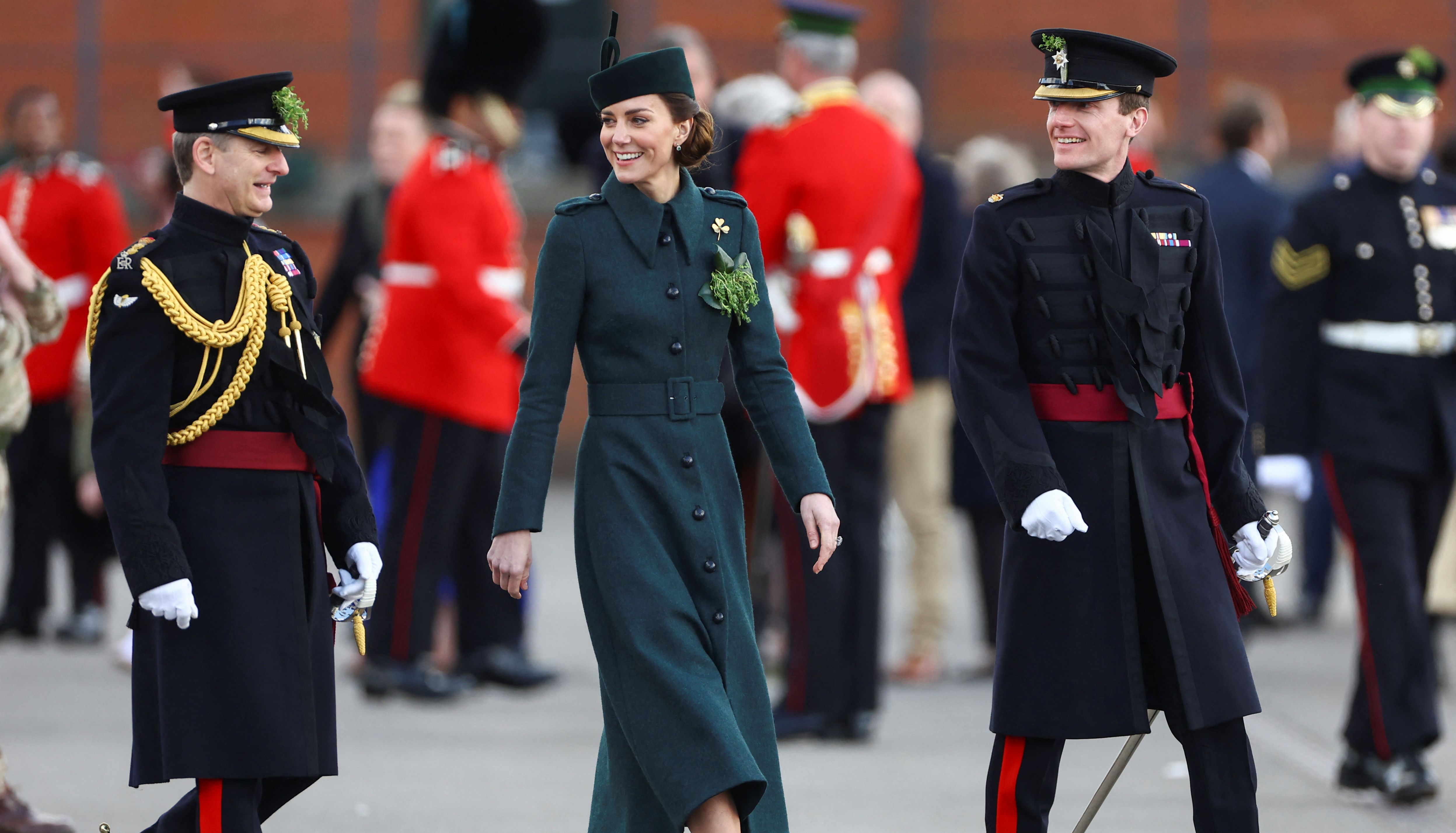 Duchess of Cambridge walks as she attends the St Patrick's Day Parade in Aldershot.