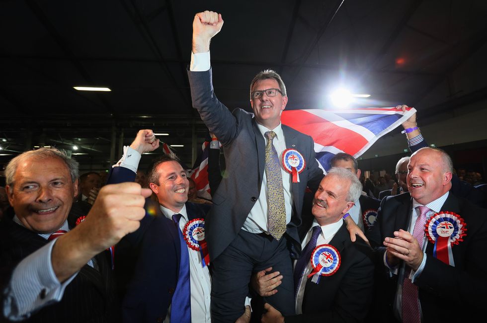 DUP candidate for Lagan Valley Jeffrey Donaldson celebrates following his election at the Eikon Exhibition Centre in Lisburn as counting is under way for the General Election.