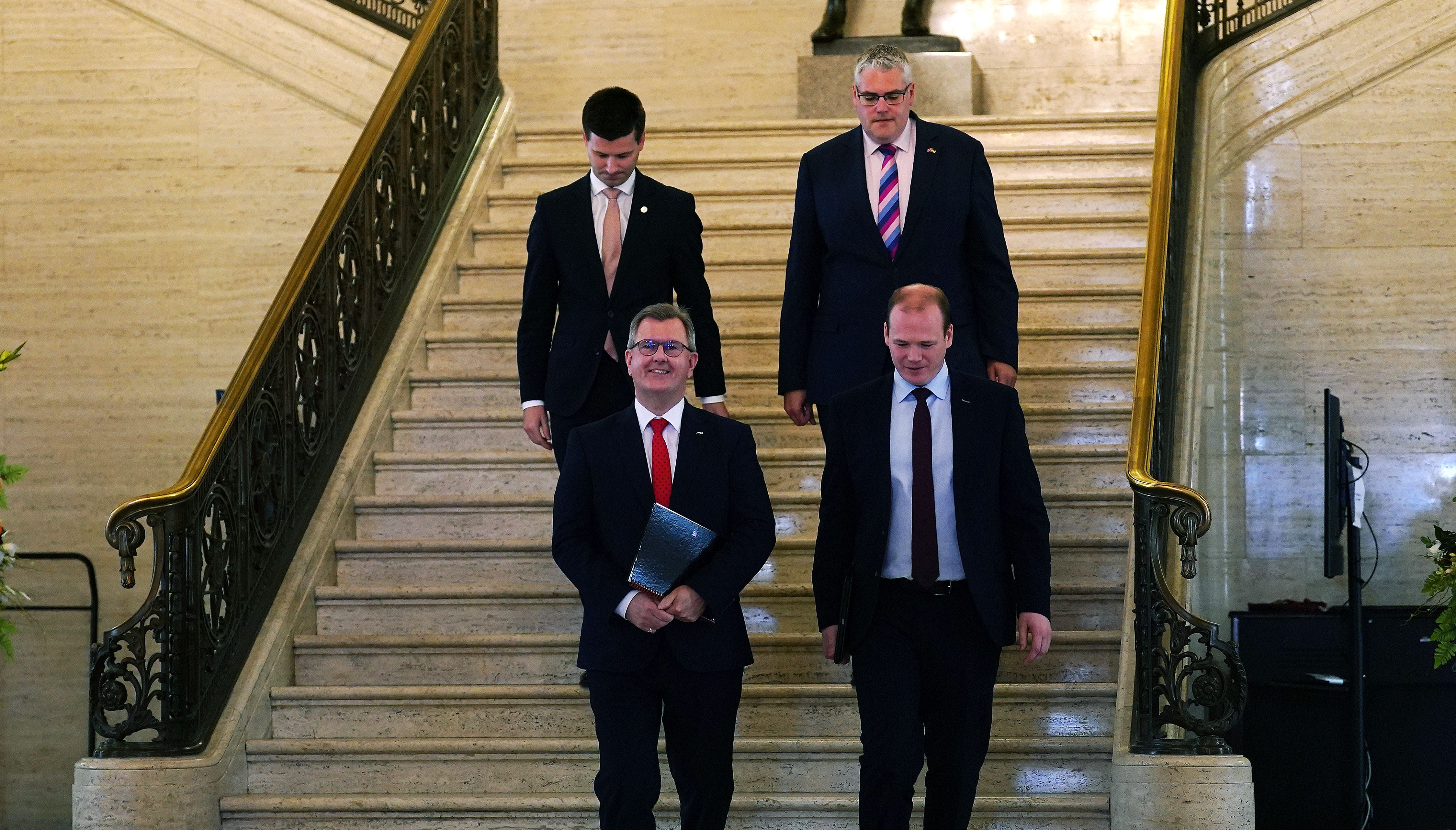 DUP leader Jeffrey Donaldson (front left) arrives to speak to the media in the great hall following his meeting with Congressman Richard Neal at Parliament Buildings, Stormont, Belfast.