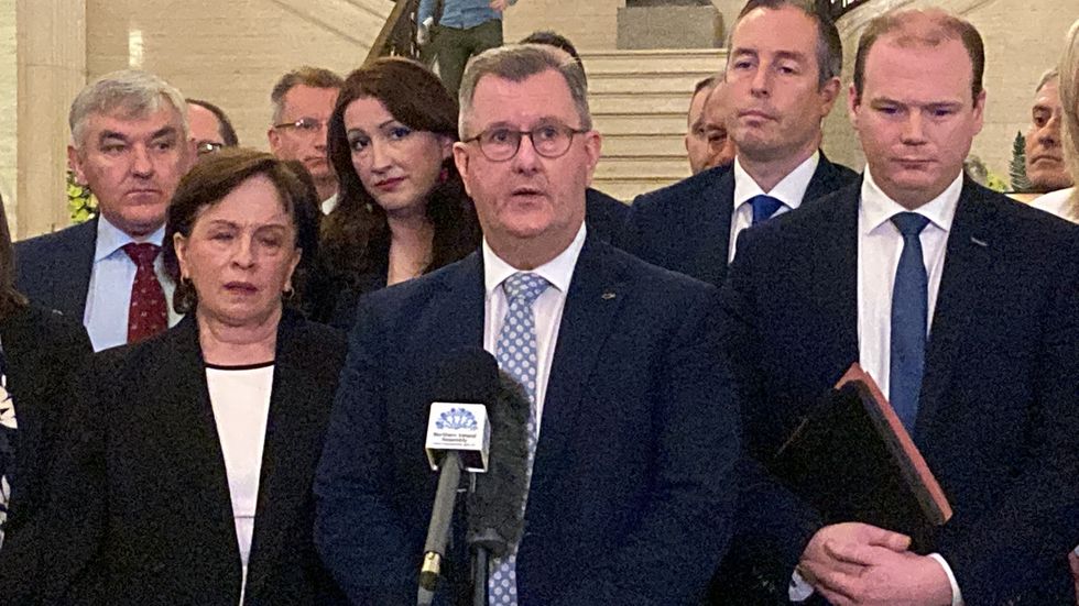 DUP leader Sir Jeffrey Donaldson (centre)speaks to the media in the Great Hall in Parliament Buildings, Stormont as he confirms his party will not nominate ministers to the Stormont Executive as the Assembly is recalled in a last attempt to resurrect devolved government before a fresh election is called. Picture date: Thursday October 27, 2022.