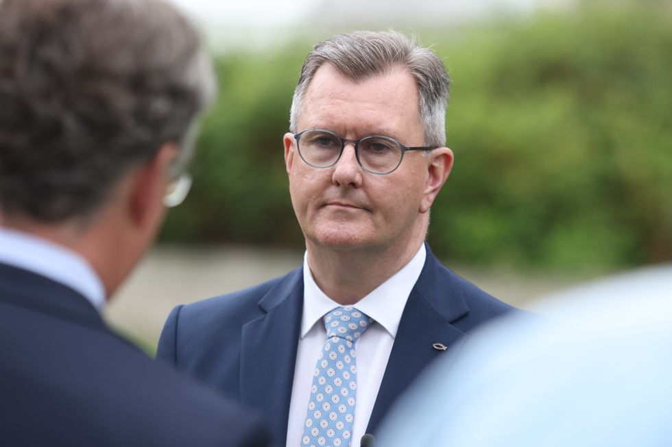 DUP leader Sir Jeffrey Donaldson talking media on College Green, central London, following the State Opening of Parliament.