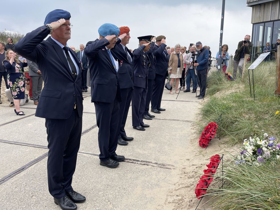 Dutch armed forces salute the memorial