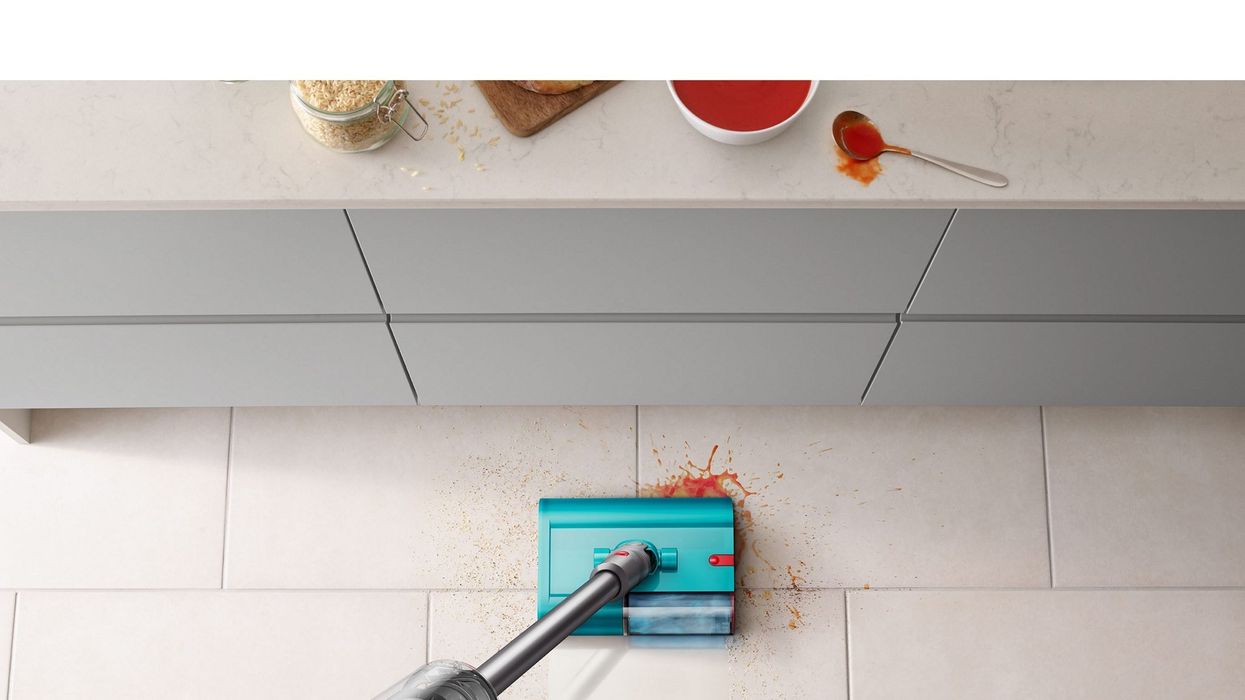 dyson v15 detect shown in action mopping the floors with the new submarine attachment