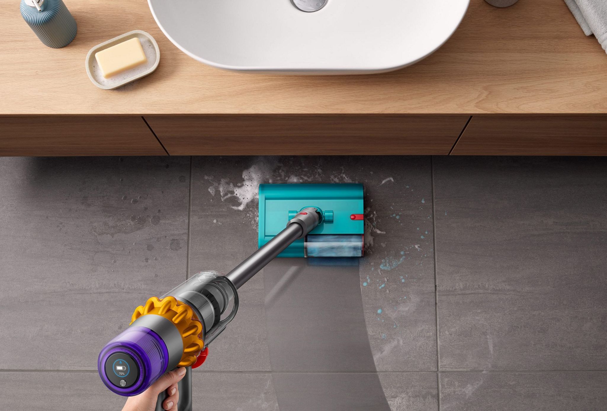 dyson v15 detect submarine shown mopping a bathroom floor
