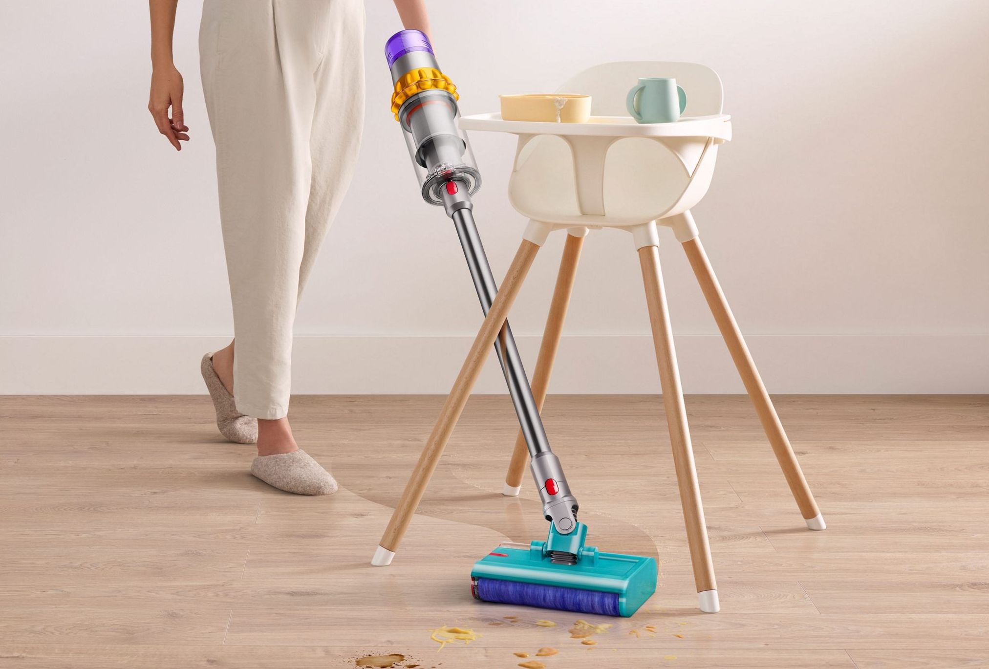 dyson v15 detect submarine shown mopping around a high-chair