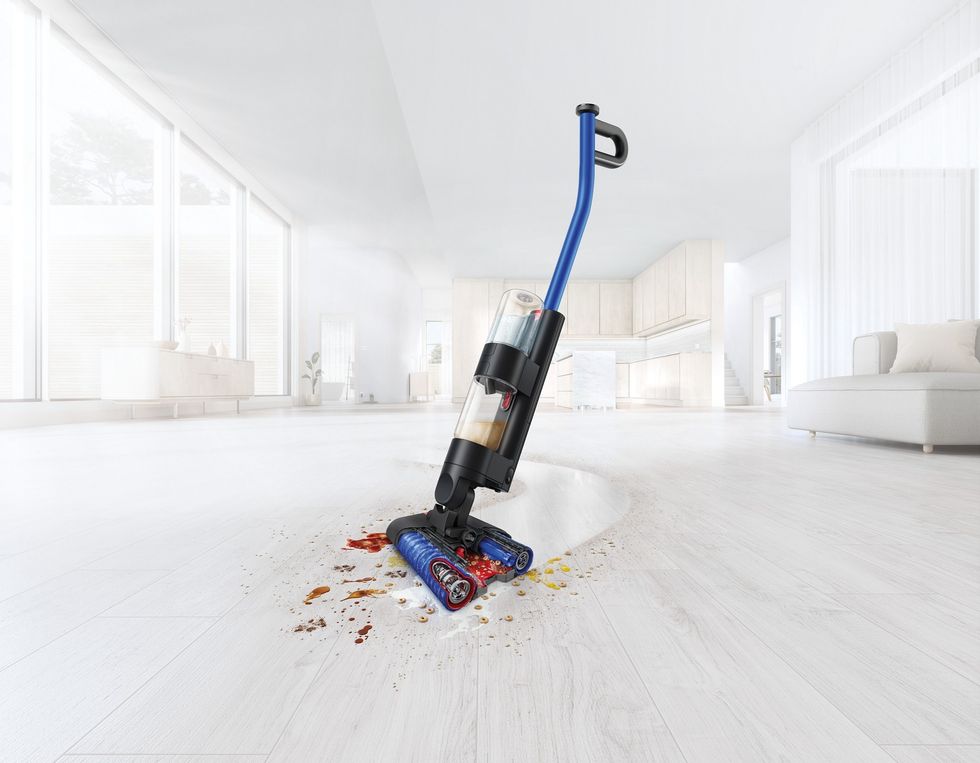 dyson wash g1 pictured cleaning stains from the floor