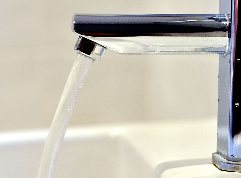 E.coli contamination alert over tap water in thousands of homes