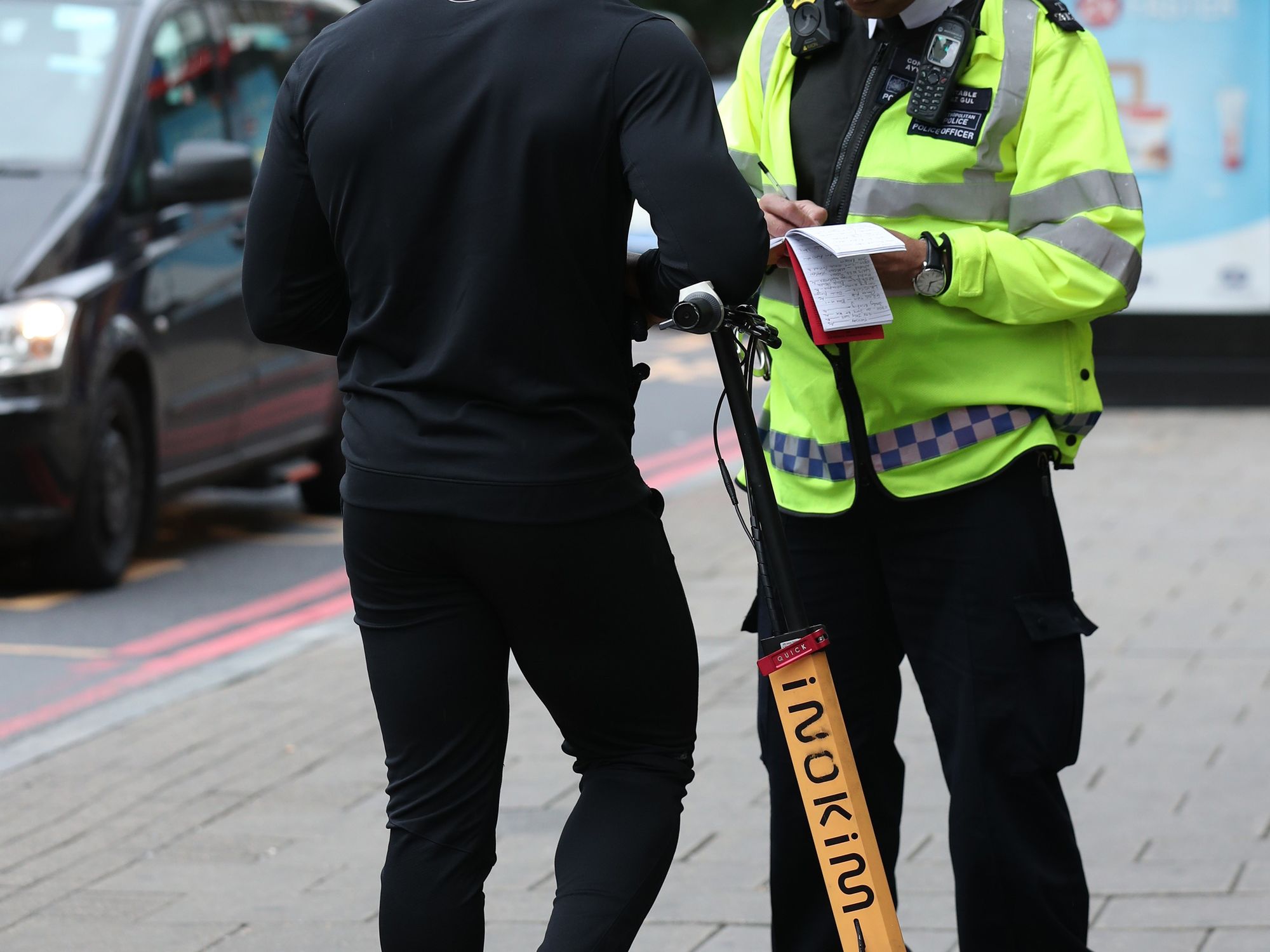 e-scooter rider getting fined