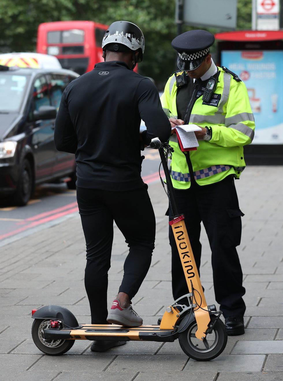 E-scooter rider getting fined