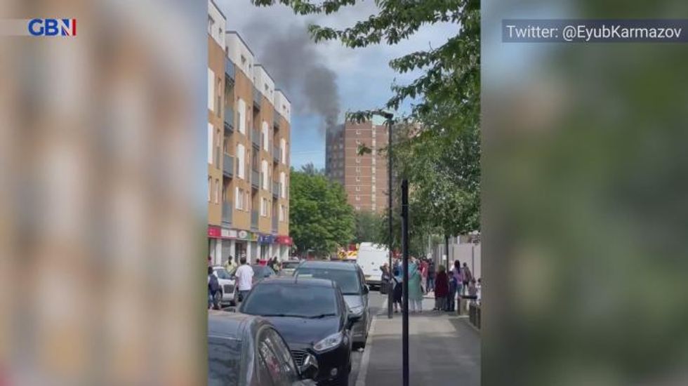 London fire: 100 firefighters rush to 13th floor blaze in tower block