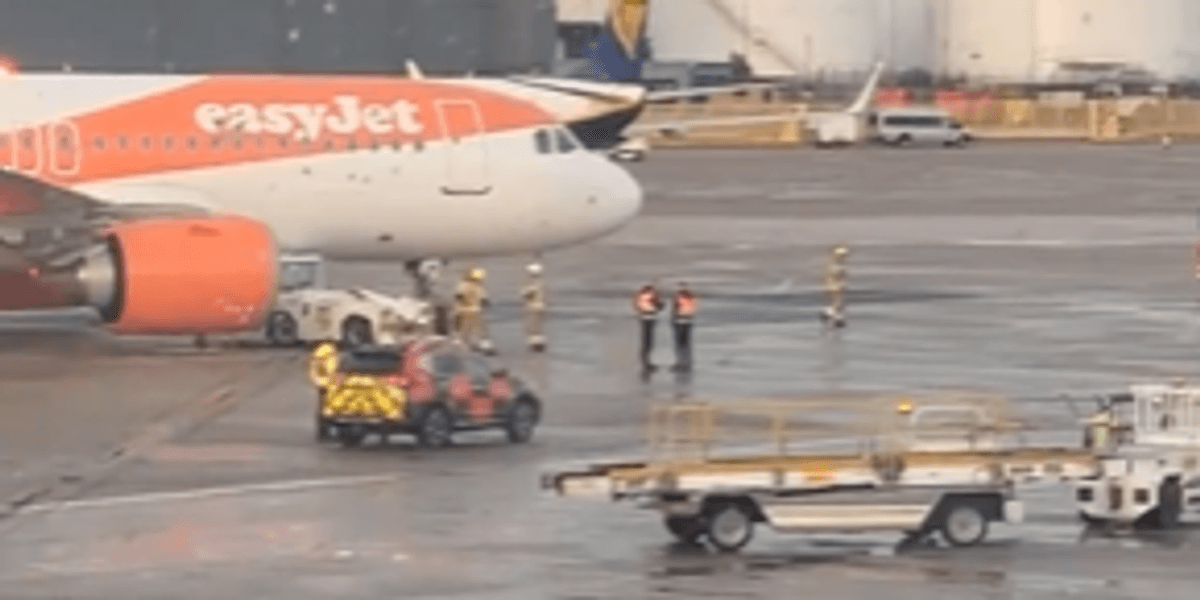 EasyJet plane involved in collision at Manchester Airport with fire brigade in attendance EasyJet plane involved in collision at Manchester Airport with fire brigade in attendance