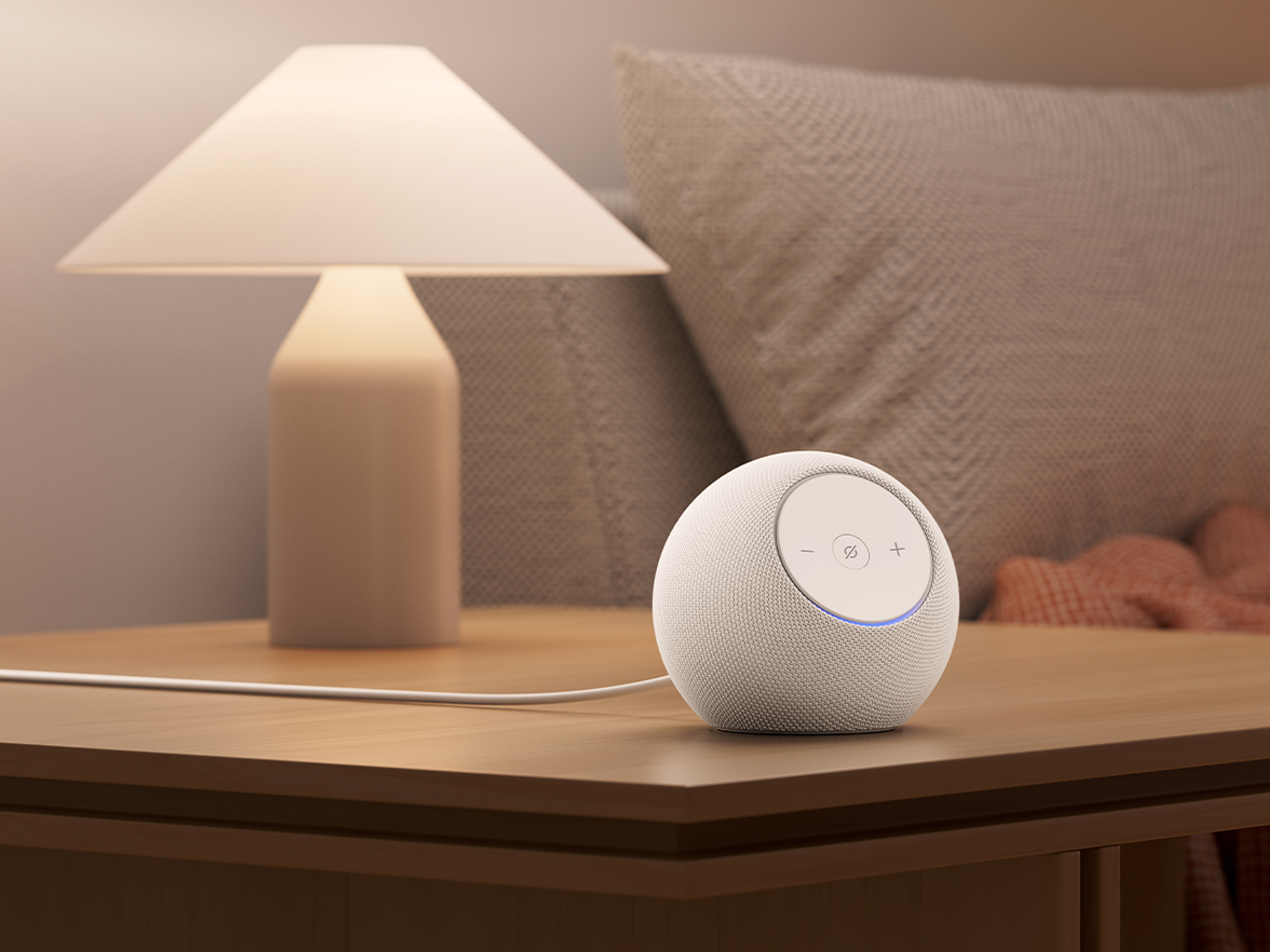 ech dot max in white on a side table in the living room