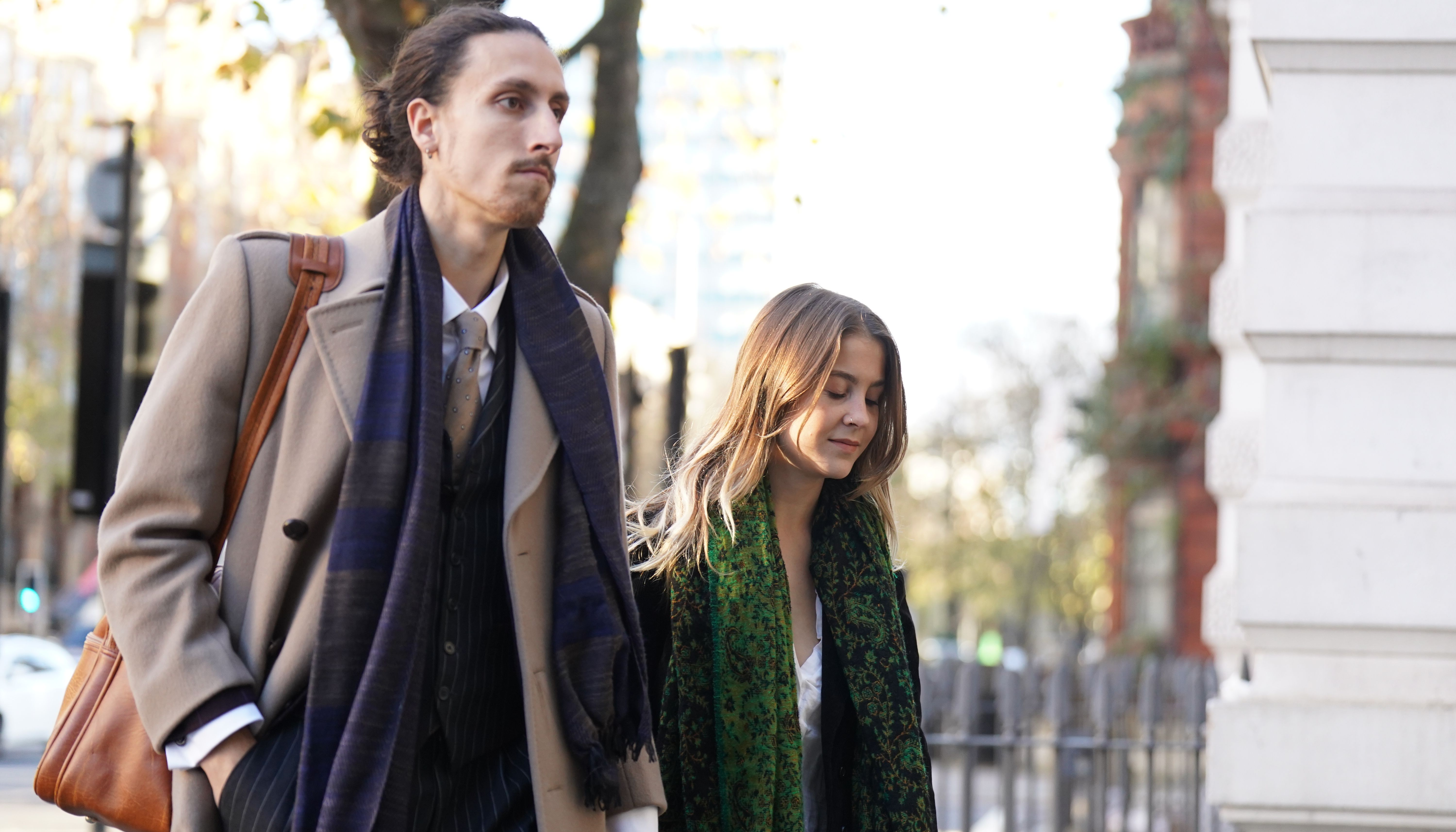 Eco-protesters Hannah Hunt (right) and Eden Lazarus arrive at Westminster Magistrates' Court, central London, charged with causing 1081.49 of criminal damage to John Constable's The Hay Wain painting and frame at the National Gallery on July 4. Picture date: Tuesday December 6, 2022.