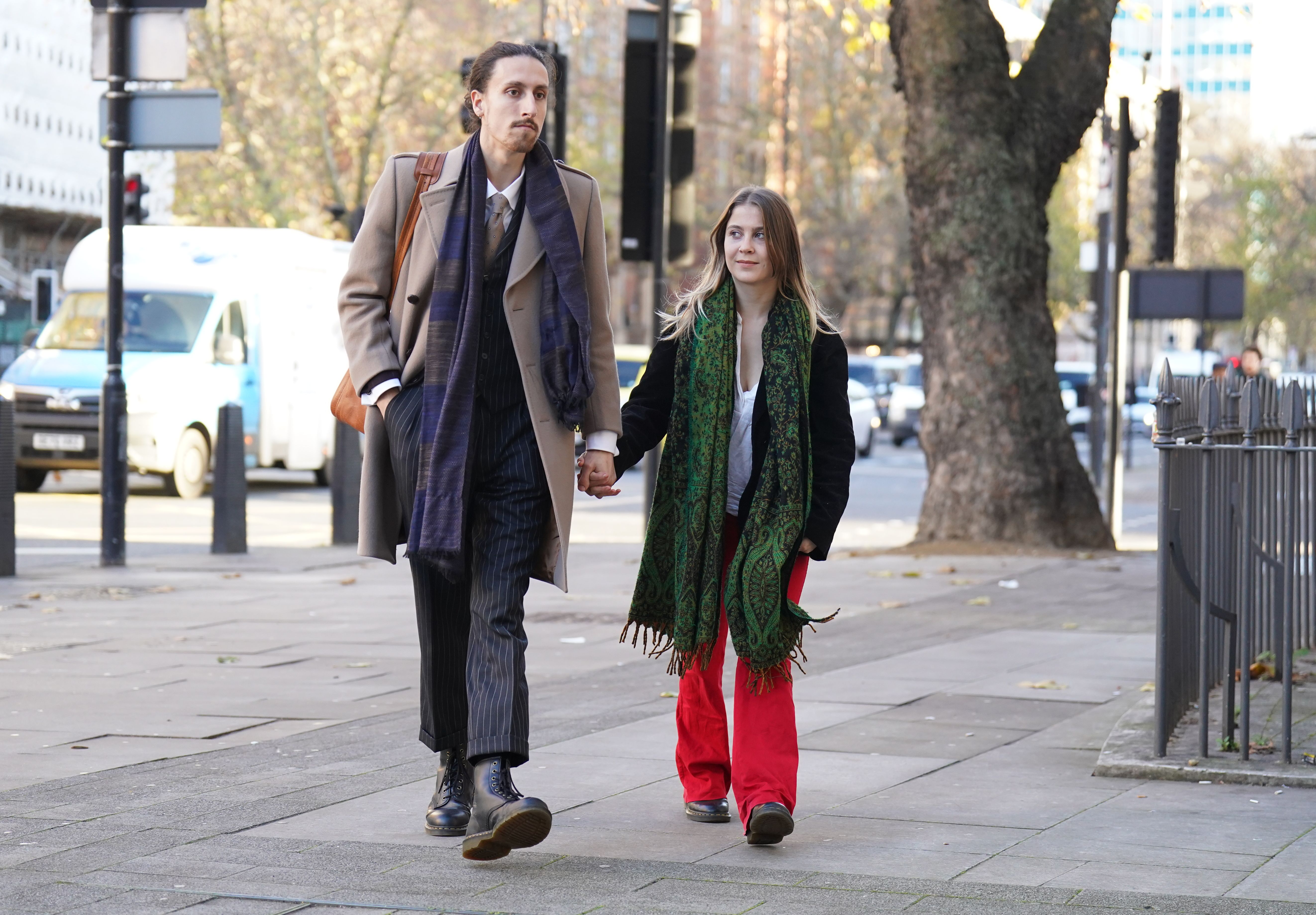 Eco-protesters Hannah Hunt (right) and Eden Lazarus arrive at Westminster Magistrates' Court, central London, charged with causing 1081.49 of criminal damage to John Constable's The Hay Wain painting and frame at the National Gallery on July 4. Picture date: Tuesday December 6, 2022.