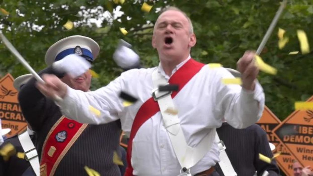 Ed Davey arrives for Liberal Democrats’ party conference with a marching band and message of ‘reclaiming patriotism’