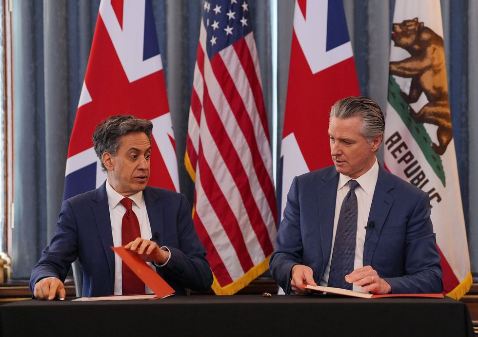 Ed Miliband and Gavin Newsom sealing the deal