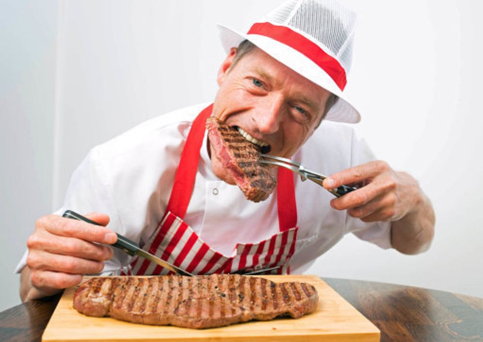 EDITORIAL USE ONLY Father-of-two, Ashley Sales, unveils a 32oz steak, which is four times the size of a typical 8oz steak and will be on sale at Morrisons for £8.16 (£9/kg) to celebrate Father's Day.