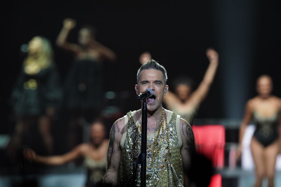 EDITORIAL USE ONLY. Not for use after November 5, 2022 Robbie Williams performs on the opening night of his XXV tour across UK and Ireland, which marks his 25 years as a solo artist, at The O2 Arena in London. Picture date: Sunday October 9, 2022.