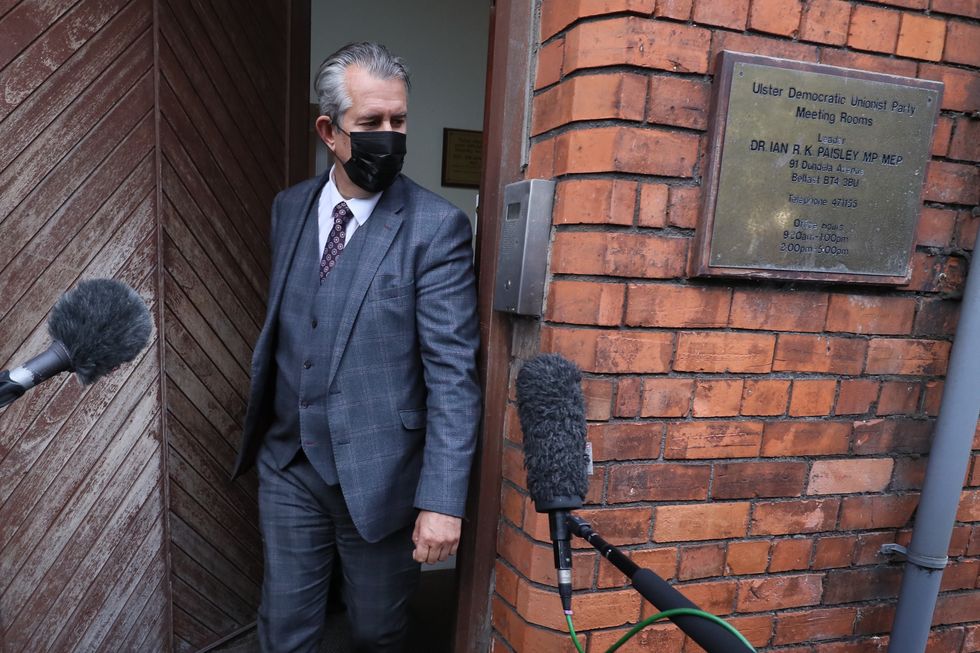 Edwin Poots leaves the DUP headquarters in Belfast after he said he will stand down as the party leader following an internal party revolt against him. He was facing questions about his leadership future after a significant majority of the party's elected representatives opposed his decision to reconstitute the powersharing Executive with Sinn Fein. Picture date: Thursday June 17, 2021.