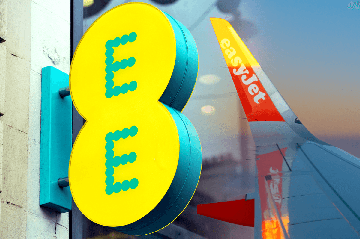 EE logo pictured outside one of its high street stores with the wing of an easyjet plane pictured omn the right side
