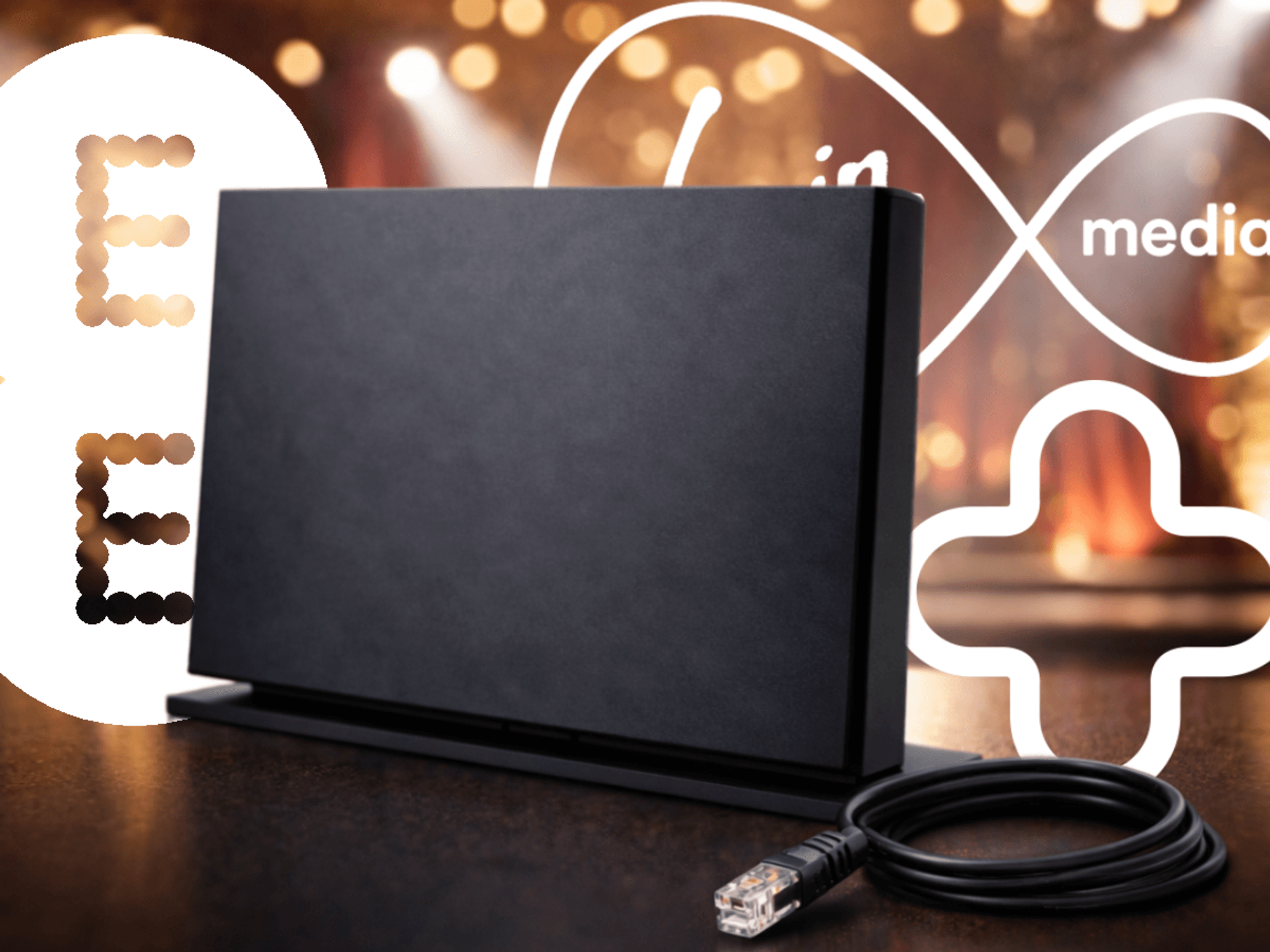 EE, Virgin Media, and Plusnet logos with Wi-Fi router sitting on a table