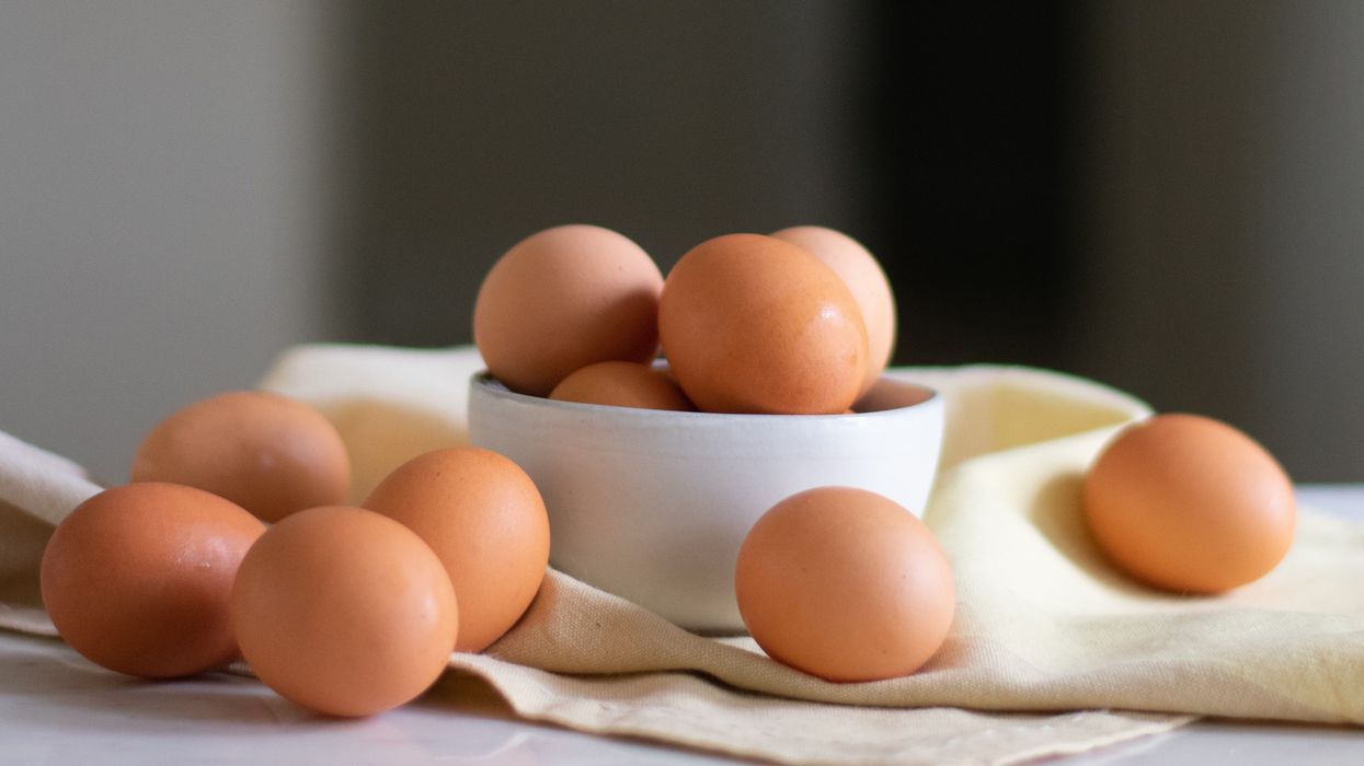 Eggs in a bowl and on table