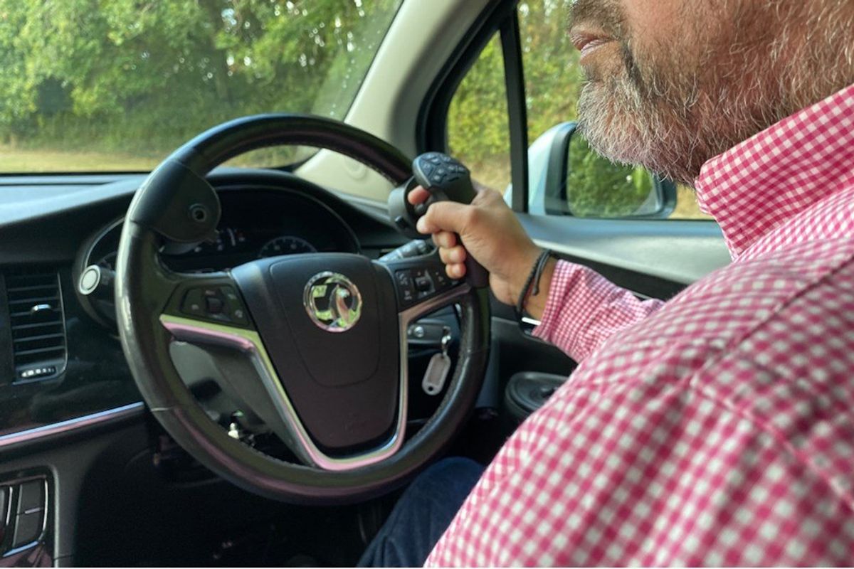 Elderly driver in car