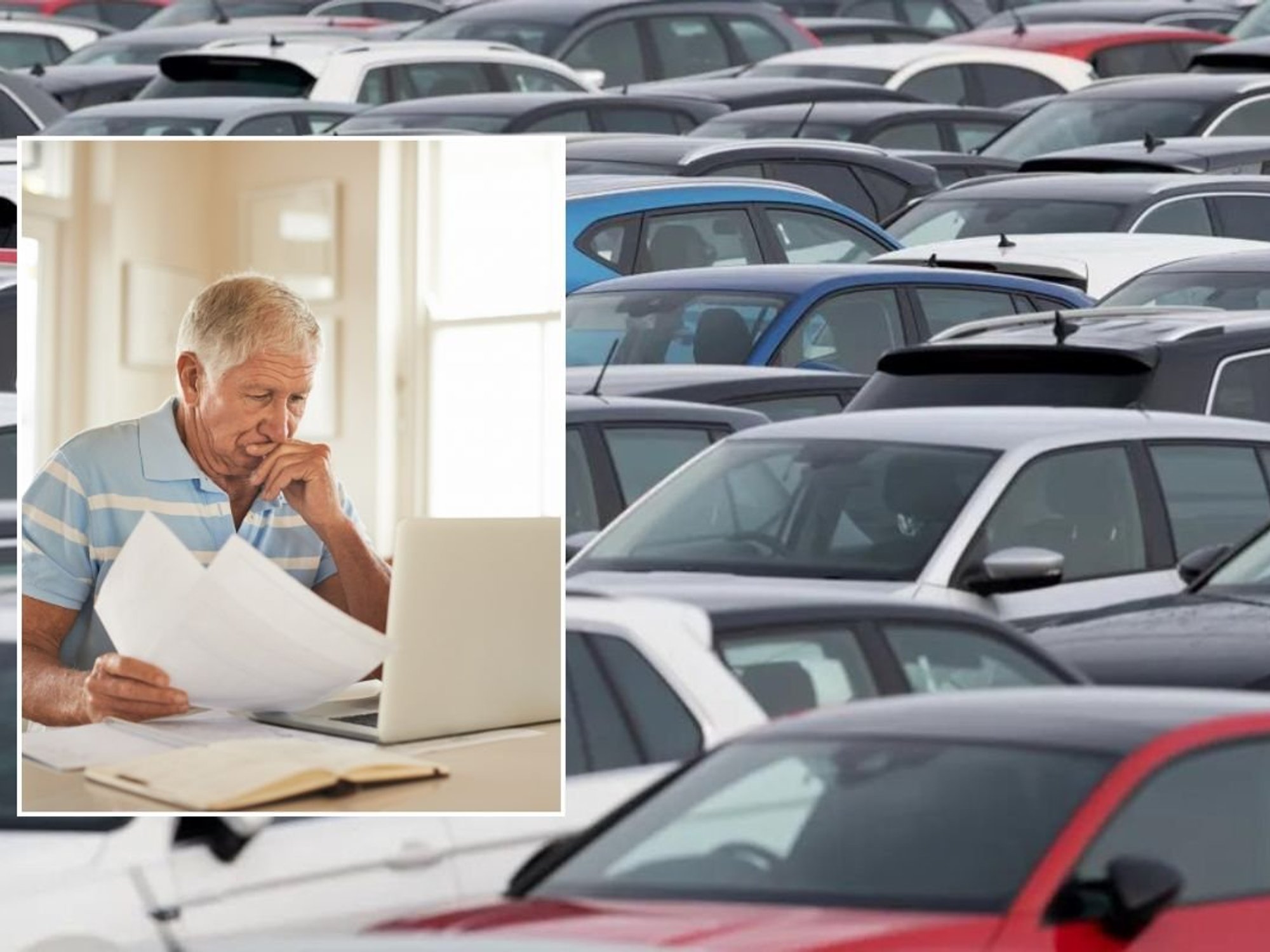 Elderly man checking his laptop and cars parked