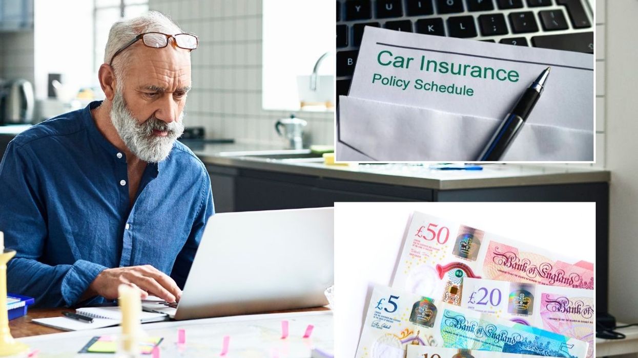 Elderly man looking at a laptop, a car insurance policy and UK money