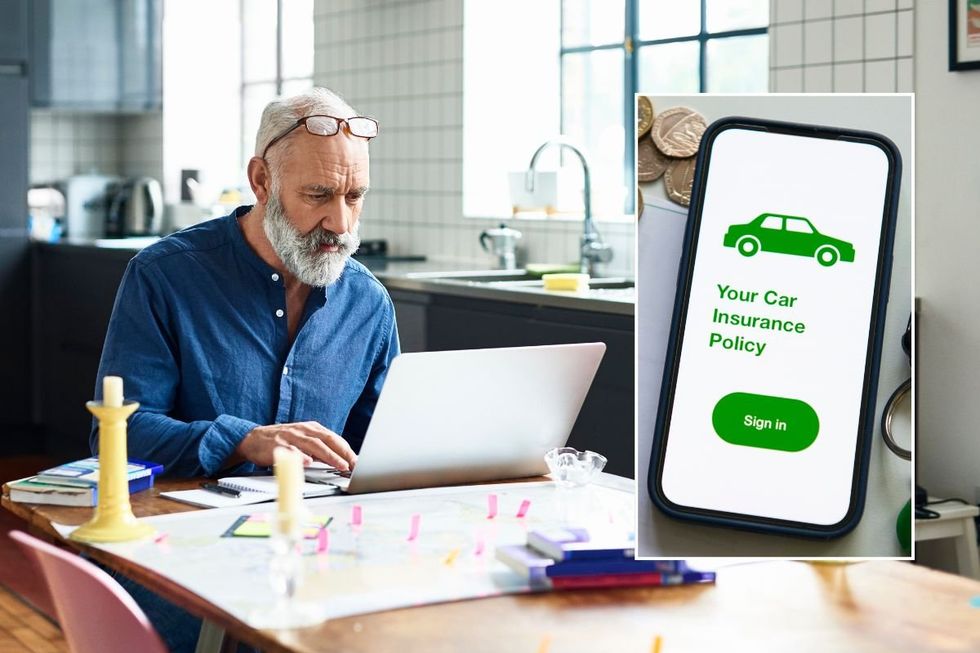 Elderly man looking at a laptop and a car insurance policy