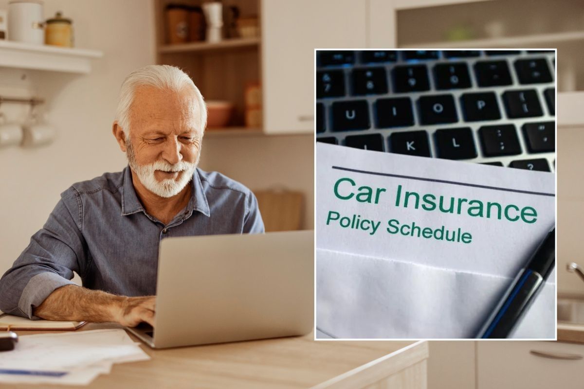 Elderly man using a laptop and a car insurance policy
