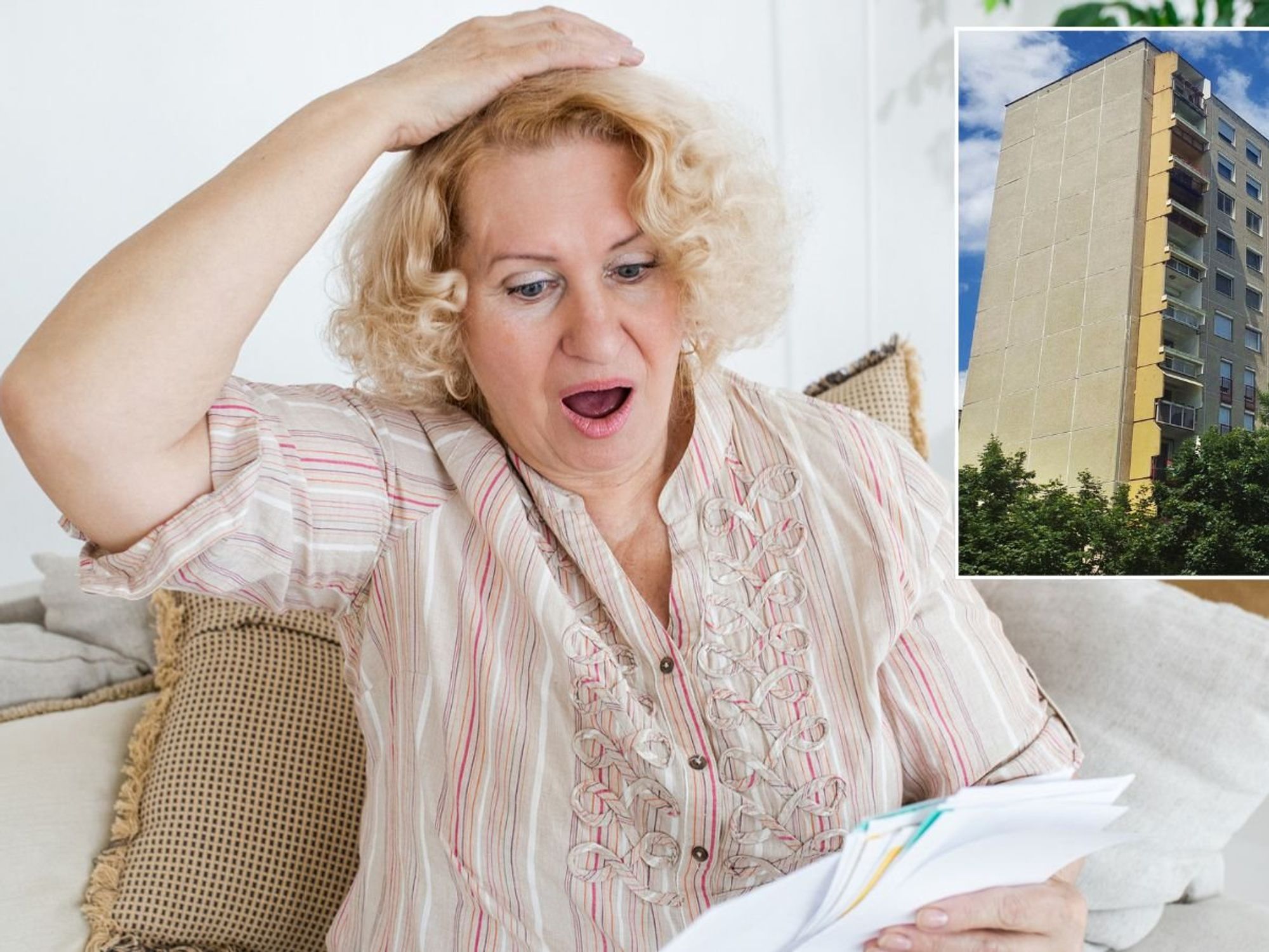 Elderly woman looking at bill