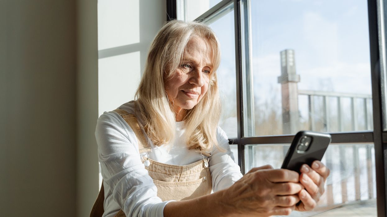 Elderly woman on her phone