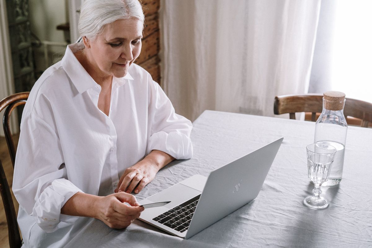 Elderly woman with a laptop