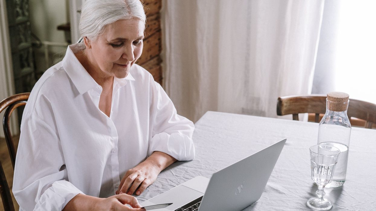 Elderly woman with a laptop