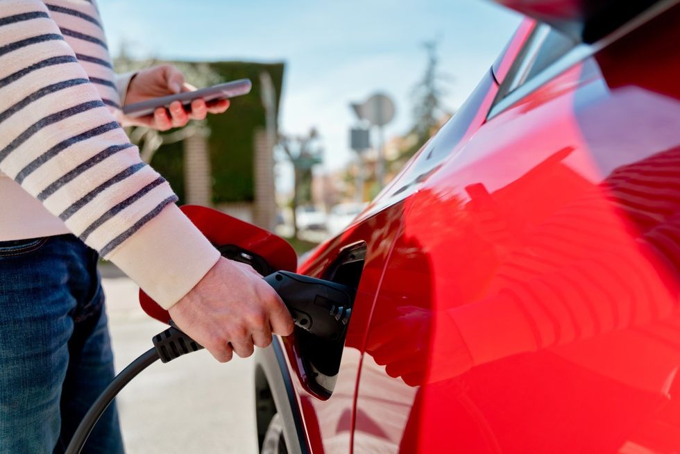 Electric car being put on charge
