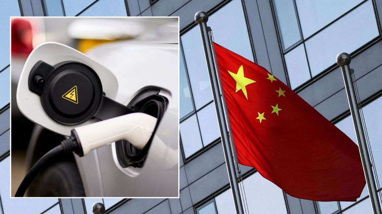 Electric car charger and a Chinese flag