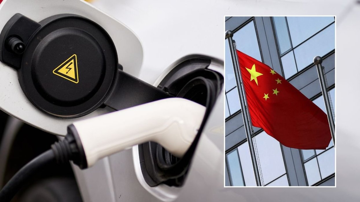 Electric car charger and a Chinese flag