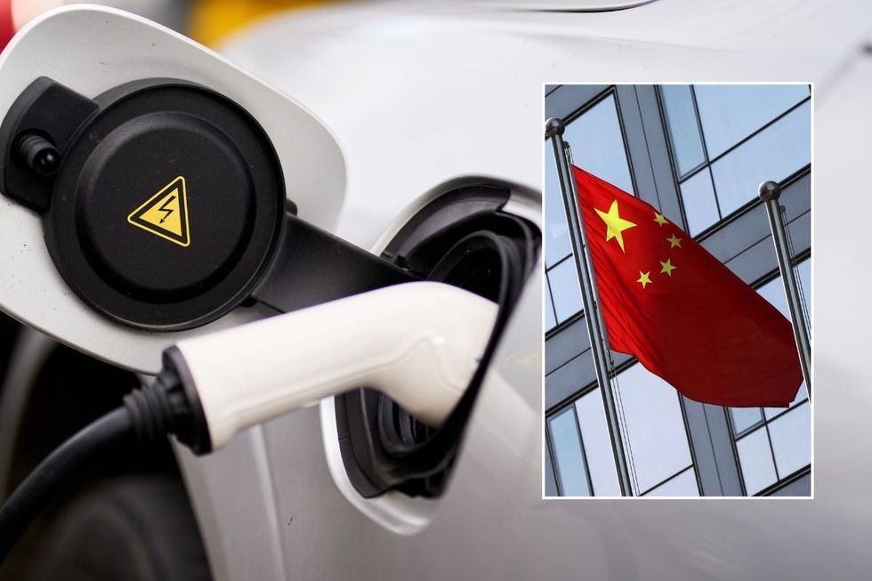 Electric car charger and a Chinese flag