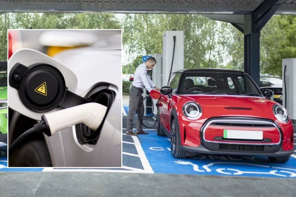 Electric car charger and a man charging an electric vehicle