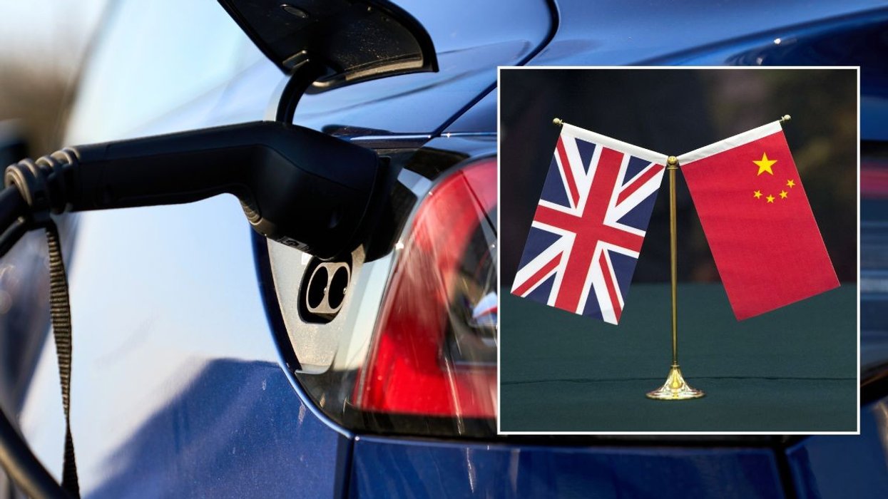 Electric car charger and a UK and China flag