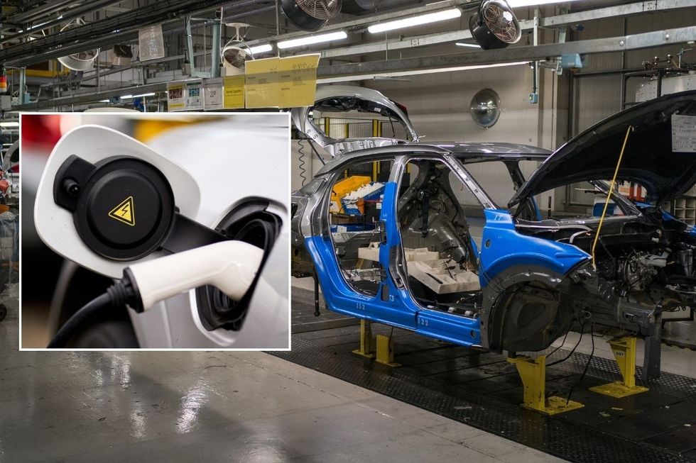 Electric car charger and an electric vehicle being manufactured
