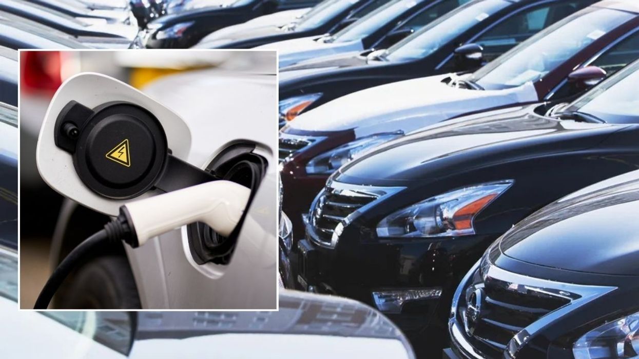 Electric car charger and vehicles parked